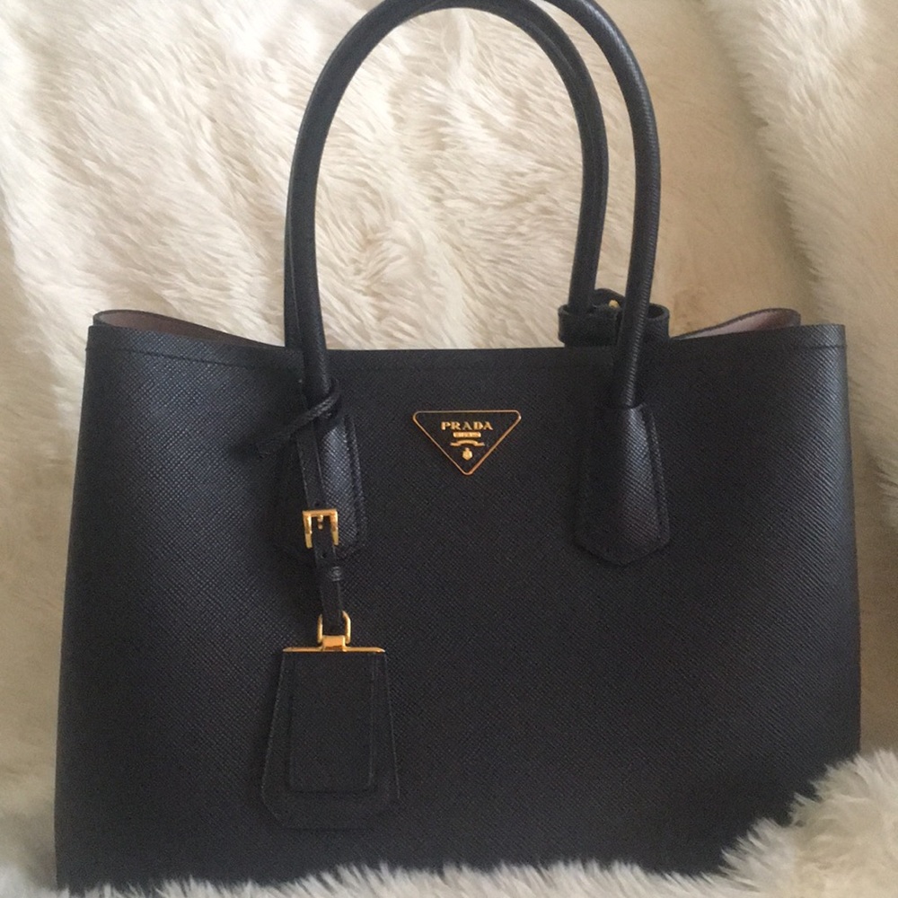 Authentic Prada HAS TO GO MAKE AN OFFER!